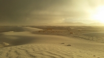 We sat out a sandstorm and it passed just before sunset The lighting under the cloud layer is unlike anything Ive experienced before White Sands NM 