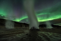 What spooky planet is this Planet Earth of course on the dark and stormy night of September  at Hverir a geothermally active area along the volcanic landscape in northeastern Iceland Geomagnetic storms produced the auroral display in the starry night sky 