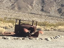 Whats left of a car in Ballarat a ghost town just outside of Death Valley with only one resident left