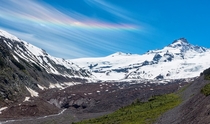 While hiking in Mt Rainier NP today a rainbow formed in the clouds over Little TahomaEmmons Glacier 
