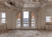 Window in a badly decayed room in an abandoned New York nursing Home OC - x