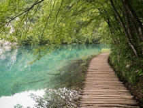 Wooden path by the lake at Plitvice Lakes National Park Croatia 