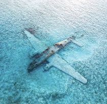 Wrecked drug smuggling plane of Pablo Escobar resting beneath the waters in the Bahamas 