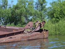 Wrecked sunken barge on the Mississippi river near Saint Paul MN 